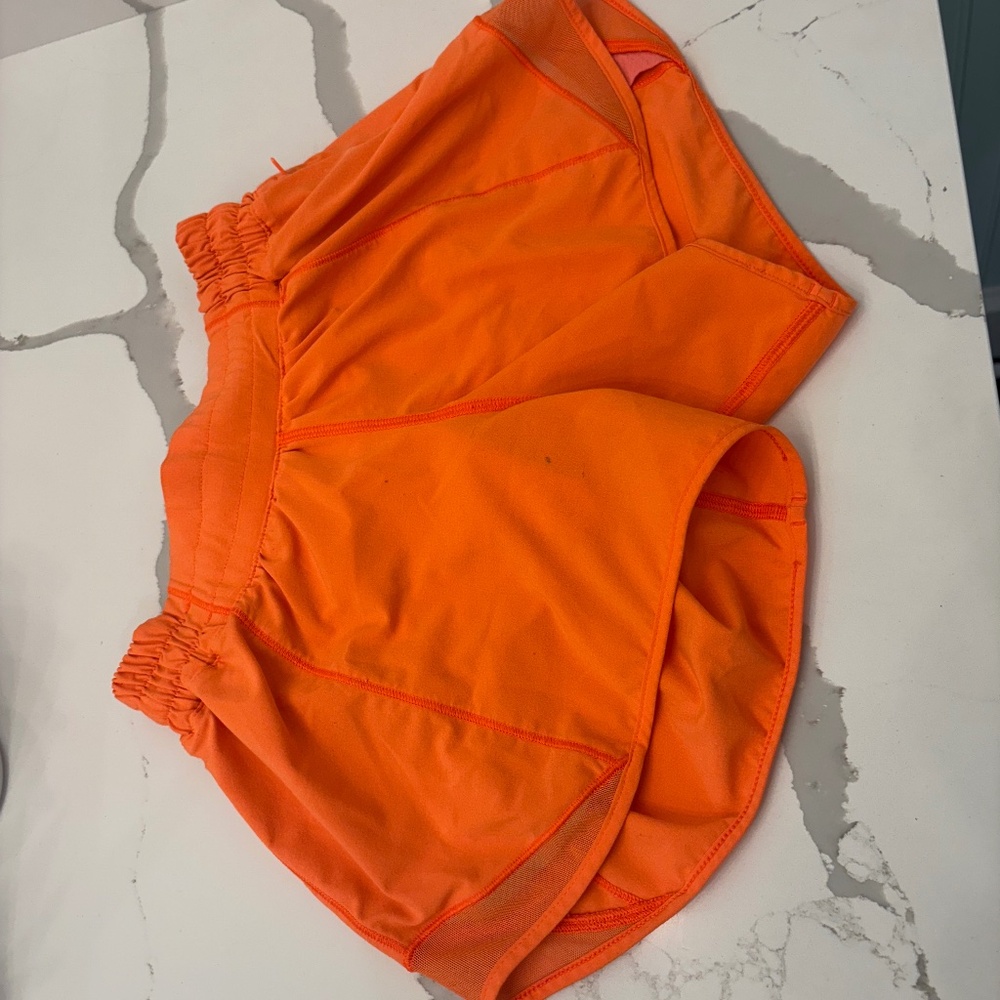 Highlighter Orange Lululemon hotty hot shorts, size 2, 4" inseam